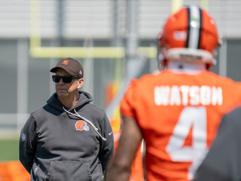 Coach Todd Monken watches players train, including Deshaun Watson at the Browns mini camp in Berea on April 21, 2026.