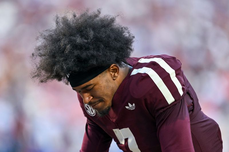 Texas A&M Aggies wide receiver KC Concepcion takes a moment before a game against the Florida Gators on Oct. 11, 2025, in College Station, Texas.