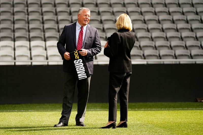 Nationwide CEO Kirt Walker talks to Dee Haslam of the Haslam Sports Group during a press conference to announce Columbus as the National Women’s Soccer League's 18th club at ScottsMiracle-Gro Field on April 21, 2026. The club, set to begin play in 2028, will be owned by Haslam Sports Group (HSG), Nationwide and Drs. Christine and Pete Edwards.