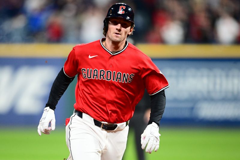Chase DeLauter runs to third on a three-run triple for the Guardians in the eighth inning against the Houston Astros, April 21, 2026, in Cleveland.