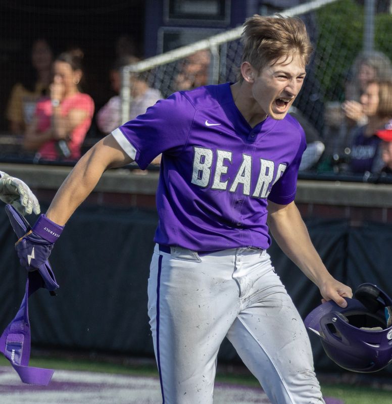 Jackson’s Kenyon Oakes celebrates scoring their first run against Hoover on Tuesday, April 21, 2026. Bob Rossiter / Special To The Canton Repository