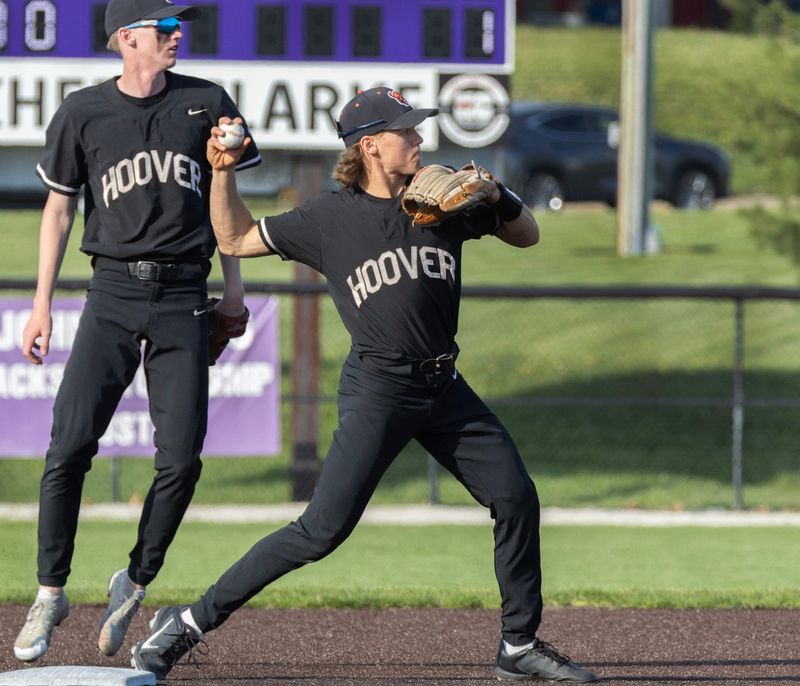 Hoover’s Ryan Cervenak turns a double play against Jackson on Tuesday, April 21, 2026. Bob Rossiter / Special To The Canton Repository
