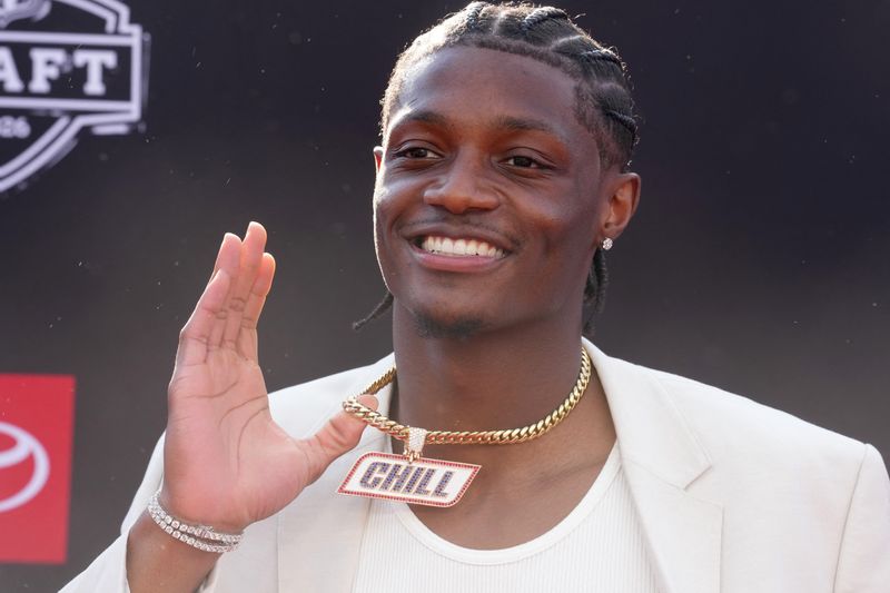 Ohio State Buckeyes receiver Carnell Tate poses on the red carpet before the 2026 NFL Draft at Point State Park. Mandatory Credit: Kirby Lee-Imagn Images