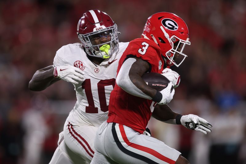 Sep 27, 2025; Athens, Georgia, USA; Georgia Bulldogs running back Nate Frazier (3) runs against Alabama Crimson Tide linebacker Justin Jefferson (10) in the first half at Sanford Stadium. Mandatory Credit: Brett Davis-Imagn Images