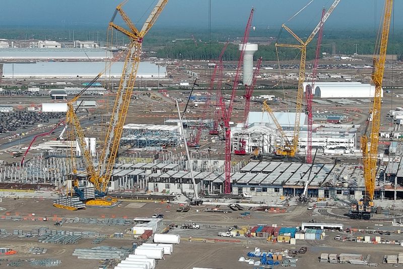 Construction continues at the Intel plant in New Albany, Ohio on Friday, April 24, 2026. The company is building a massive $20+ billion semiconductor "Silicon Heartland" campus near Columbus, Ohio, to produce advanced chips. Due to market demands, the timeline has shifted, with the first plant now expected to be complete in 2030 and operational by 2031, with a second plant following.