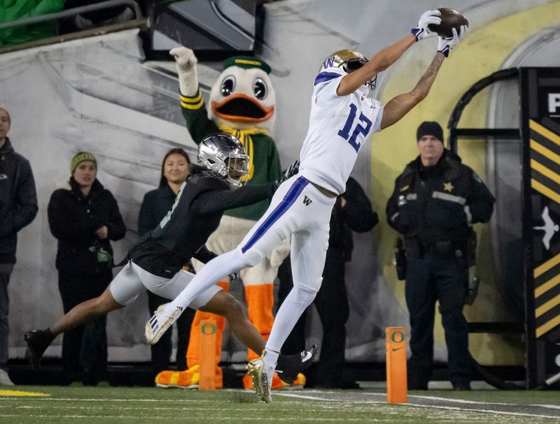 Washington wide receiver Denzel Boston hauls in a catch as the No. 1 Oregon Ducks host the Washington Huskies Saturday, Nov. 30, 2024 at Autzen Stadium in Eugene, Ore.