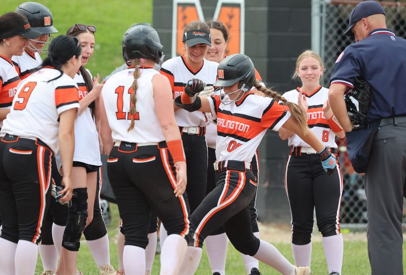 Marlington outfielder Chelsea Miller celebrates a home run in the third inning against Salem