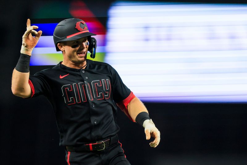 Matt McLain reacts after hitting a two-run home run in the fifth inning against the Detroit Tigers at Great American Ball Park April 24. McLain later hit another two-run homer, in the seventh inning, that tied the game at 5.