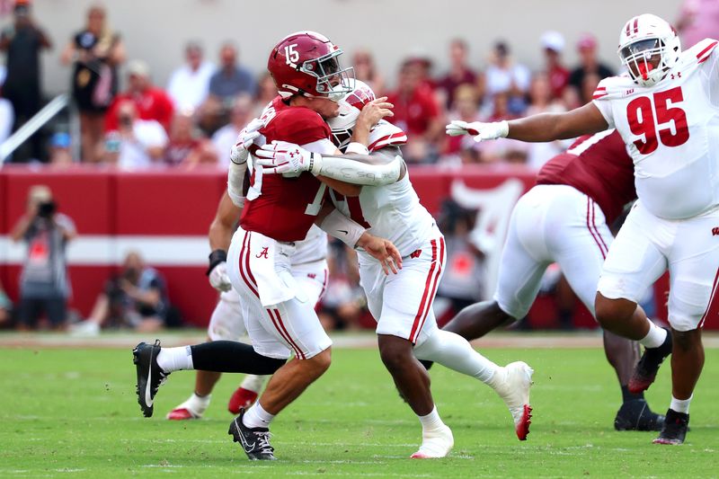 Wisconsin Badgers linebacker Darryl Peterson III, right, sacks Alabama Crimson Tide quarterback Ty Simpson on Sept. 13, 2025, in Tuscaloosa, Alabama.