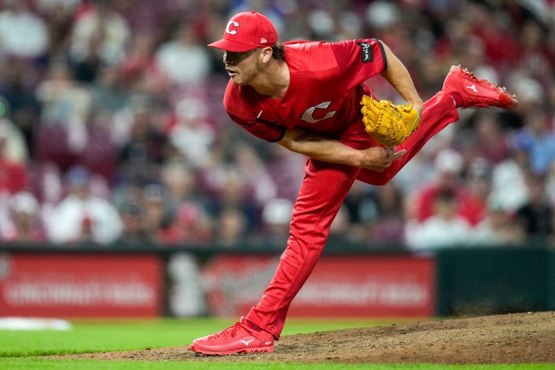 Cincinnati Reds pitcher Emilio Pagán (15) throws a pitch in the ninth inning of the MLB Interleague game between the Cincinnati Reds and the Detroit Tigers at Great American Ball Park in downtown Cincinnati on Saturday, April 25, 2026. The Reds won the second game of the series, 9-2.