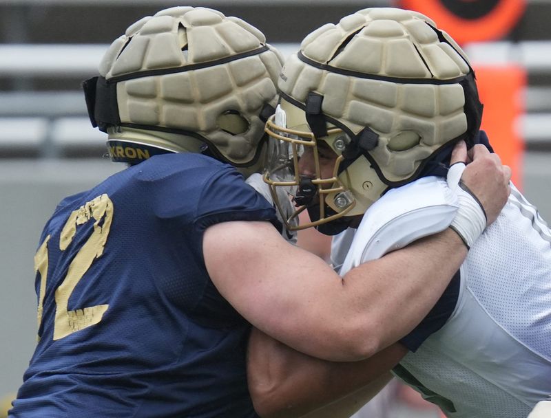 Akron Zips offensive lineman Colin Lyons blocks defensive lineman Cyrus Durham during UA's Spring Showcase on April 25, 2026, in Akron.