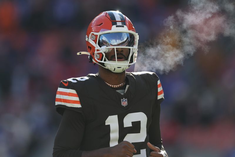 Dec 21, 2025; Cleveland, Ohio, USA; Cleveland Browns quarterback Shedeur Sanders (12) warms up prior to a game against the Buffalo Bills at Huntington Bank Field. Mandatory Credit: Scott Galvin-Imagn Images