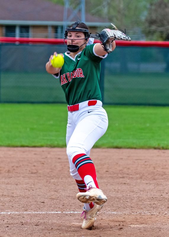 Oak Harbor's Morgan LaLonde delivers a pitch. Oak Harbor topped visiting Genoa 10-2 on April 27, 2026.
