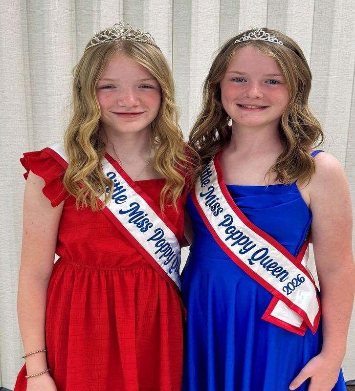 Kenley Smith (right), a Junior Member of the Auxiliary, was crowned the new Little Miss Poppy Queen for 2026 by her big sister, who is the outgoing Poppy Queen for 2025, Kohen Smith (left).
