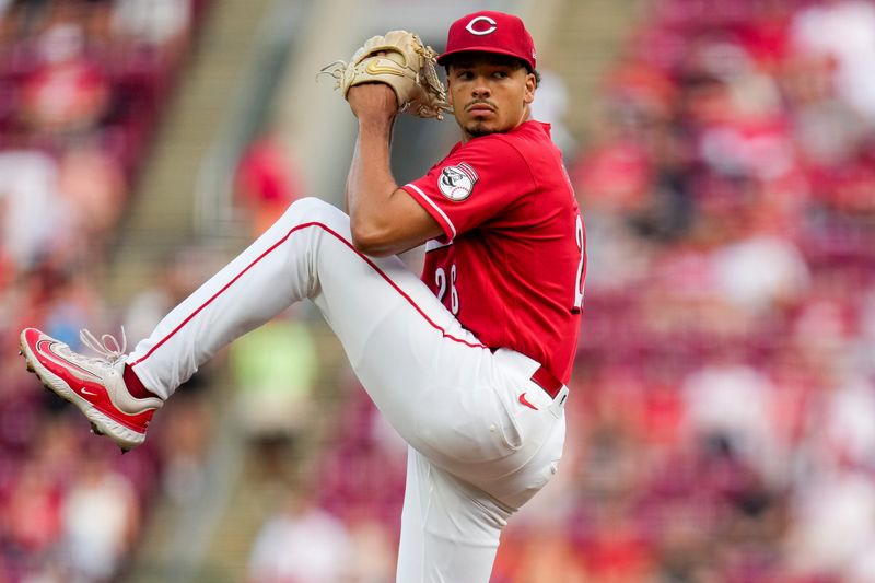 Cincinnati Reds pitcher Chase Burns (26) throws a pitch in the first inning of the MLB National League game between the Cincinnati Reds and the Colorado Rockies at Great American Ball Park in downtown Cincinnati on Tuesday, April 28, 2026. The Reds led 4-1 after three innings.