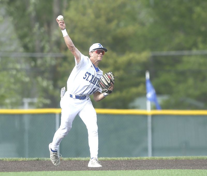 St. Xavier senior Braden Bricking throws to first as St. Xavier defeated La Salle 7-6 in baseball April 28, 2026, at St. Xavier High School's Gruber Family Field.