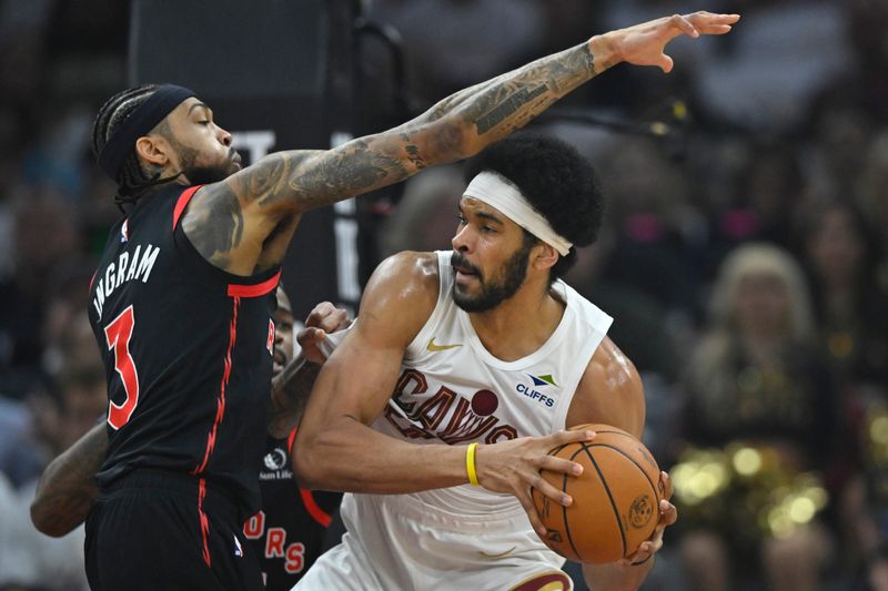 Apr 29, 2026; Cleveland, Ohio, USA; Toronto Raptors forward Brandon Ingram (3) defends Cleveland Cavaliers center Jarrett Allen (31) in the first quarter of game five of the first round of the 2026 NBA Playoffs at Rocket Arena. Mandatory Credit: David Richard-Imagn Images