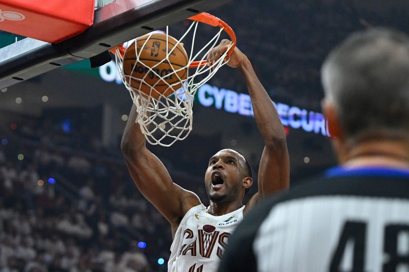 Cleveland Cavaliers forward Evan Mobley dunks against the Toronto Raptors during Game 5 of an NBA playoffs first-round series April 29, 2026, in Cleveland.