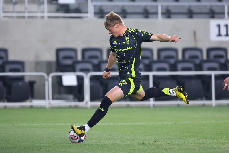 Apr 29, 2026; Columbus, OH, USA; Columbus Crew forward Chase Adams (46) shoots the ball during the second half against One Knoxville SC at ScottsMiracle-Gro Field. Mandatory Credit: Joseph Maiorana-Imagn Images