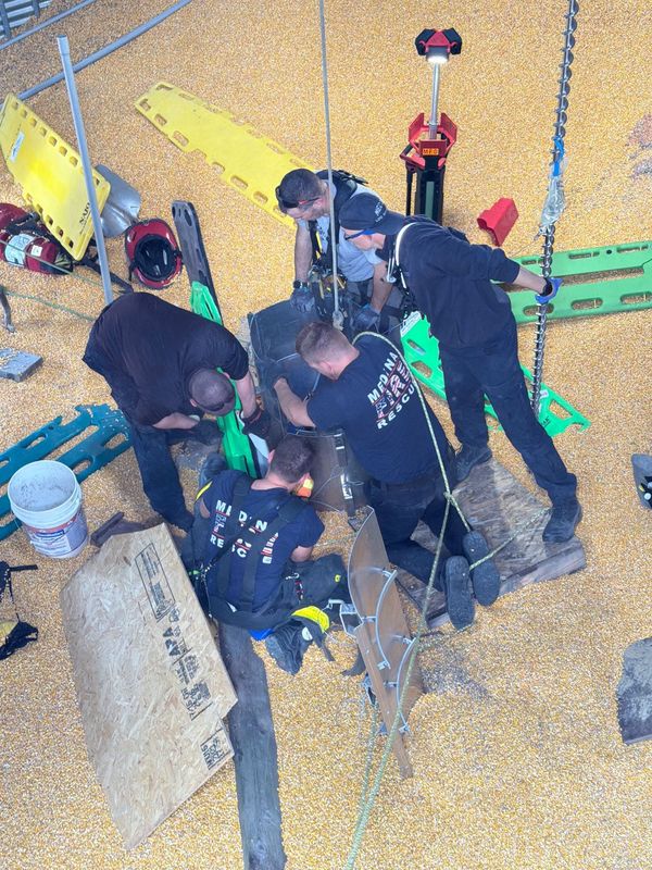Crews from the Medina Fire Department and the Medina County All-Hazards Team rescue a man trapped in a grain silo.