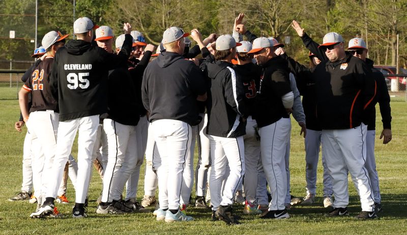 Strasburg-Franklin huddles in the outfield after the team defeated Tuscarawas Central Catholic 9-2 on April 30, 2026.