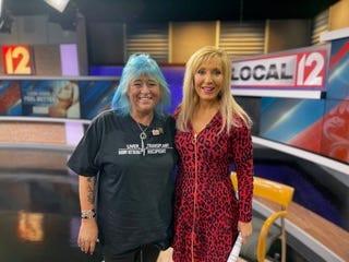 Sherry Patterson stands beside longtime Local 12 medical reporter Liz Bonis, who died at her home on April 30 after she was diagnosed with colon cancer in 2023.