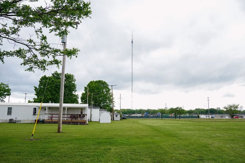 The city does not intend to purchase private land adjacent to McCoy Park that houses occupied mobile homes as some Southwest residents feared.