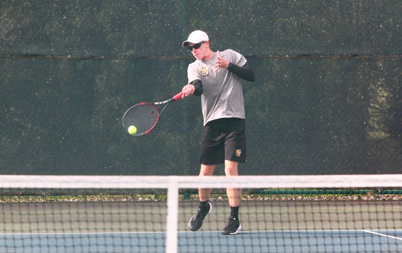 Watkins Memorial's Graham Smith hits a forehand in a No. 2 singles match during the Licking County tournament at Mount Vernon Nazarene on May 2, 2026.