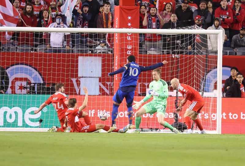 FC Cincinnati midfielder Evander (10) scores a goal during the first half against the Chicago Fire FC at Soldier Field.