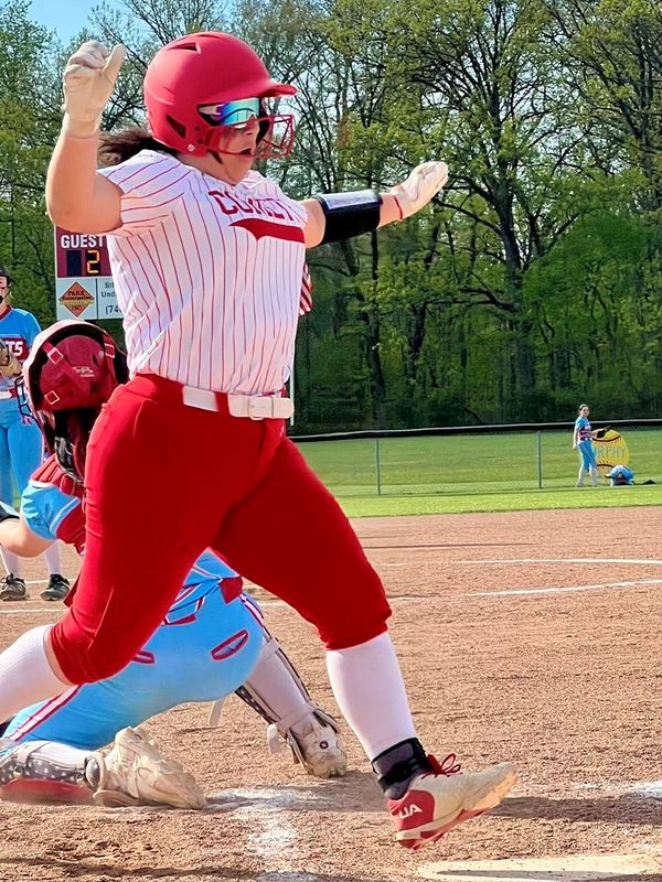 Elgin's Hayleigh Lowther scores at Ridgedale during a softball game May 4, 2026.
