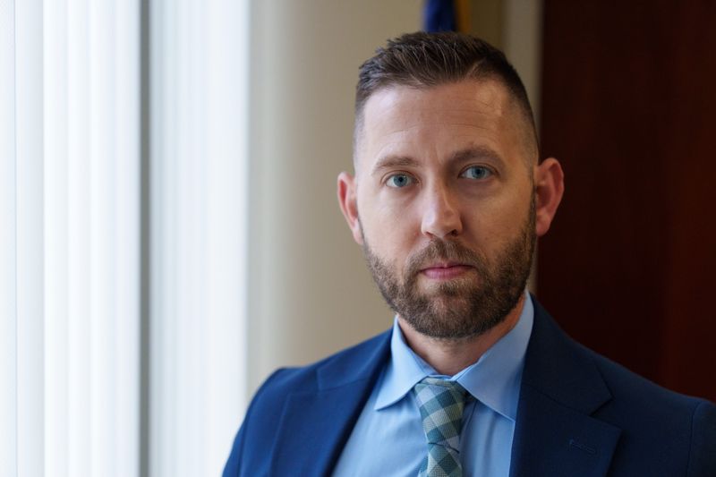 Kenton County police Sgt. Andrew Kenner stands for a photo at the Kenton County Justice Center in Covington, Kentucky on Wednesday, April 29.
