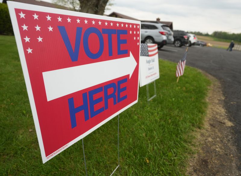 A sign directs people were to vote in Stark County.