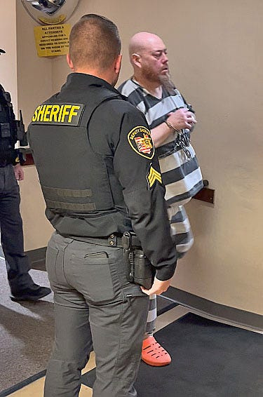 Brian Wilson exits the Morrow County Courthouse after pleading guilty to aggravated murder.