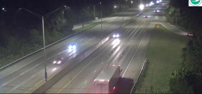 A screenshot from an ODOT video of Xiaoke Fan, 30, of Upper Arlington, driving a carjacked Mercedes-Benz southbound the wrong way in the far left lane and shoulder of the northbound lanes of State Route 315 minutes before Columbus police say she crashed head-on into another Mercedes-Benz.  An assistant prosecutor for the Columbus City Attorney's office driving the other vehicle died later at a nearby hospital and an environmental attorney who was a passenger in that car was critically injured, as was Fan.