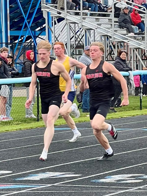 Marion Harding's Aycen Rich, right, and Drake Holbrook finished 1-2 in the boys 100 meters at the Marion County Track and Field Meet.