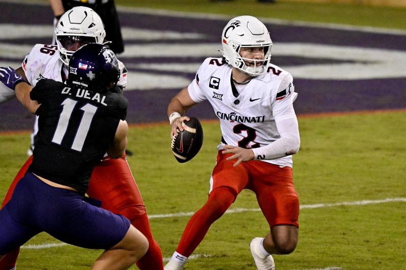 Nov 29, 2025; Fort Worth, Texas, USA; Cincinnati Bearcats quarterback Brendan Sorsby (2) runs with the ball during the second half against the TCU Horned Frogs at Amon G. Carter Stadium. Mandatory Credit: Jerome Miron-Imagn Images