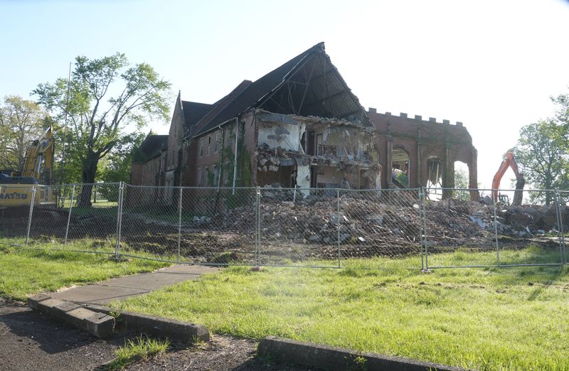 Demolition of the old Massillon State Hospital, 3000 Erie St. S, started May 4 on property owned by CommQuest. The area is to be turned into a green space down the road to benefit CommQuest clients.