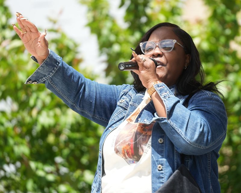 Rev. Tiesha Askew with Redeemed Acts Ministries preaches at the National Day of Prayer held at Duncan Plaza in Massillon.