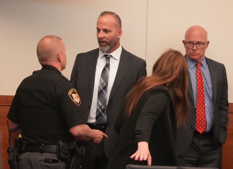 Jason Meade talks with a deputy after he was found guilty of reckless homicide in Franklin County Common Pleas Court Thursday, May 7, 2026. Michael Jason Meade, 47, faced charges of murder and reckless homicide in connection with the Dec. 4, 2020, shooting death of 23-year-old Casey Goodson Jr.