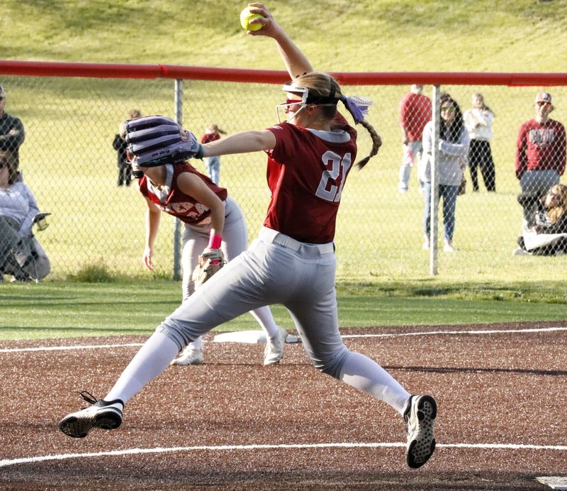 Dover's Abby Lint fires a pitch to a Tuscarawas Valley batter in the seventh inning on May 7, 2026. The Crimson Tornadoes won 2-0.