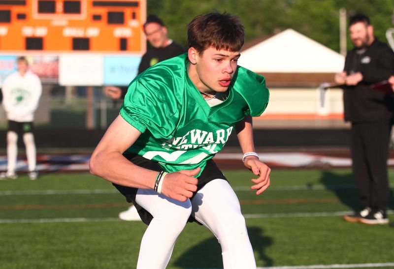 Newark Catholic's Landon Cox participates in an agility drill during the Licking County college football showcase at Heath on May 7, 2026.