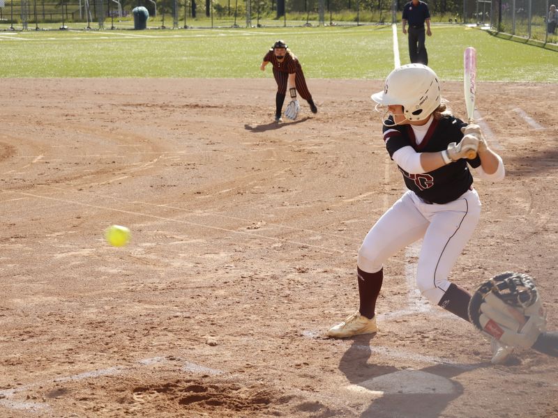 John Glenn's Addi Babcock (1) prepares to unleash a swing at the ball during non-league action with Strasburg on Thursday, May, 7, 2026 in New Concord. The Muskies collected a slim 2-1 victory in a battle between two of the top softball programs in the Eastern District.