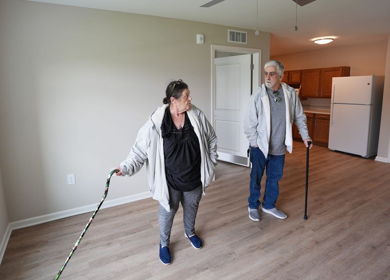 Kathie Perine-Bifano and her husband Dan Bifano tour an ADA compliant apartment in Newton Family Apartments in Canton. The couple are in the application process to live at the complex.