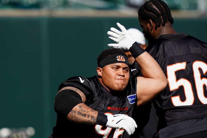Bengals defensive tackle Landon Robinson (96) runs through a drill during a rookie mini camp workout at the Bengals practice facility in downtown Cincinnati on Friday, May 8, 2026.