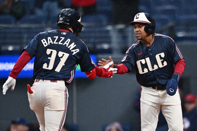 Cleveland Guardians' Travis Bazzana (37) celebrates with Jose Ramirez after hitting a home run against the Minnesota Twins on May 8, 2026, in Cleveland.