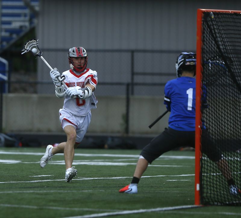 Dixie Heights senior Bray Brzygot (8) shoots and scores a goal during Dixie Heights' win over Walton-Verona during the KHSAA District 5 boys lacrosse semifinals May 8, 2026, at Covington Catholic.