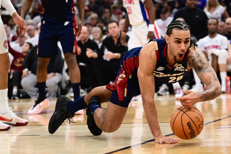 Cavaliers guard Jaylon Tyson attempts to save a ball in the first half against the Detroit Pistons during Game 3 in the second round of the playoffs, May 9, 2026, in Cleveland.