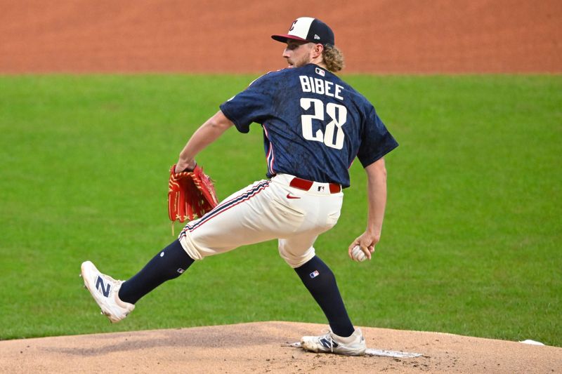 Guardians starting pitcher Tanner Bibee delivers a first-inning pitch against the Minnesota Twins, May 9, 2026, in Cleveland.