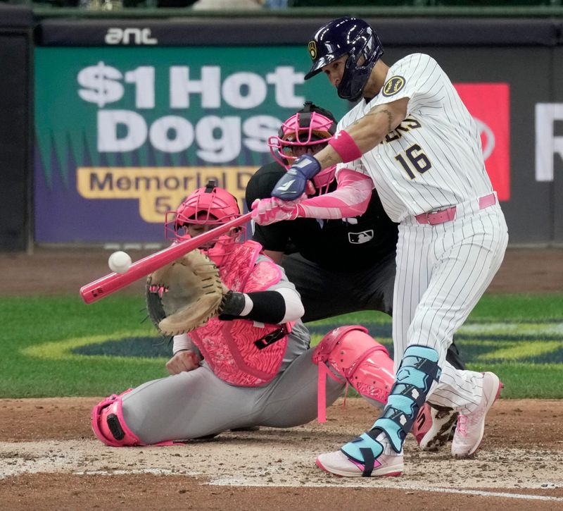 Milwaukee Brewers left fielder Blake Perkins (16) hits a two-run single during the fourth inning of their game against the New York Yankees Sunday, May 10, 2026 at American Family Field in Milwaukee, Wisconsin.