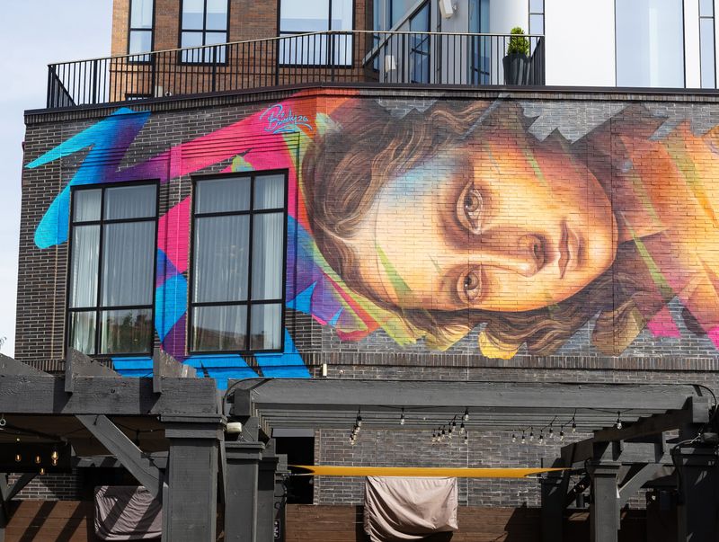 The new mural “She Moves with Color,” in the Short North by artist Mandi Caskey